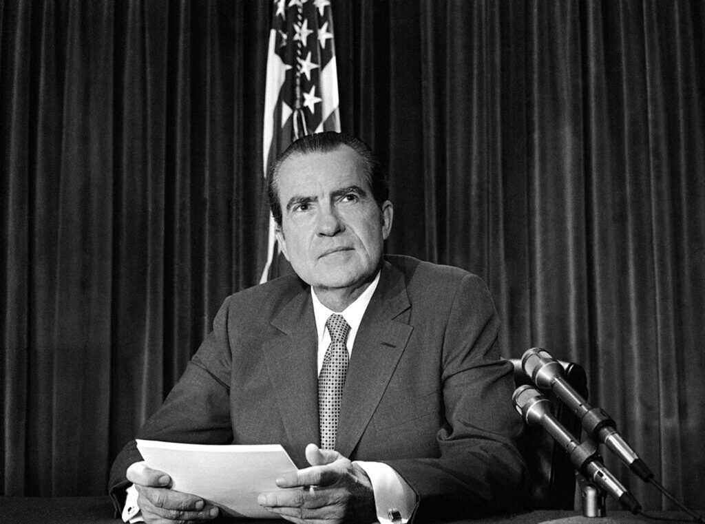 President Richard Nixon sits in his White House office after delivering the nationwide address in Washington, May 8, 1972.